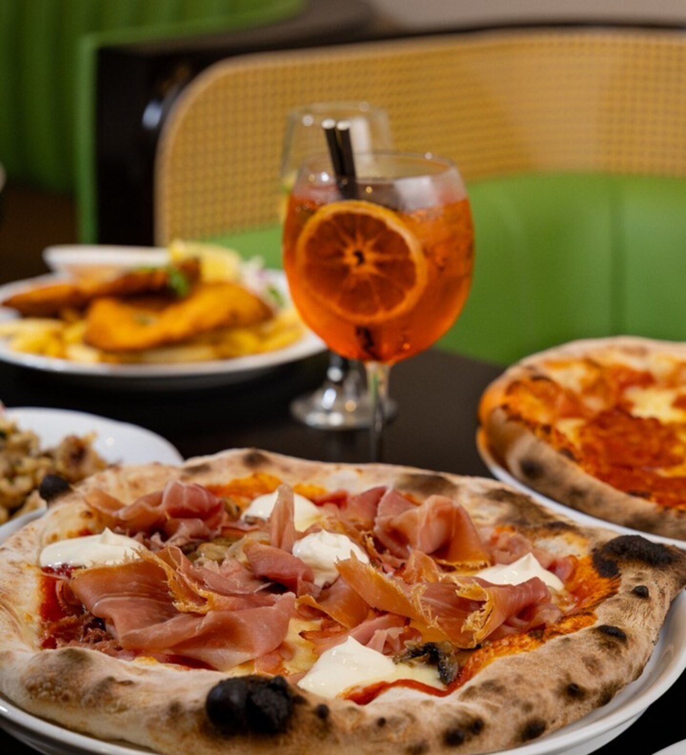 Antipasto with prosciutto pizza and an Aperol spritz